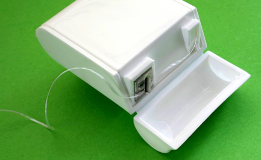 dca-blog_flossing-container-on-green
